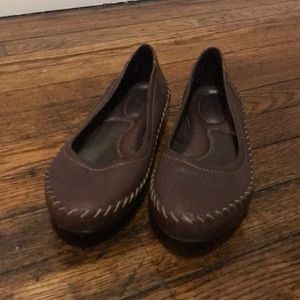 Brown leather flats
